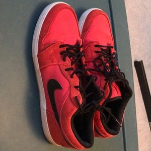 Red low top Air Jordans